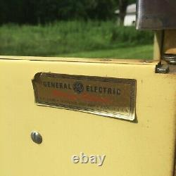 Vintage 1950s GE General Electric Metal Yellow storage cabinet desk display