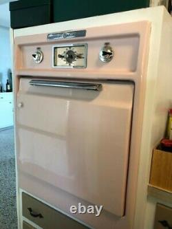 Vintage 1950s General Electric push button pink oven and stove top