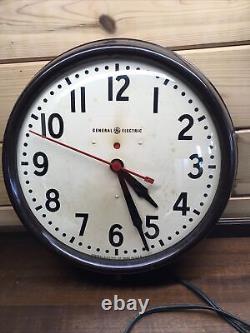 Vintage GENERAL ELECTRIC GE Red Eye School Industrial Wall Clock Works 1H1612