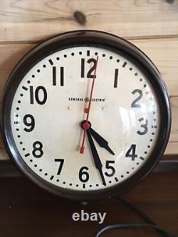 Vintage GENERAL ELECTRIC GE Red Eye School Industrial Wall Clock Works 1H1612