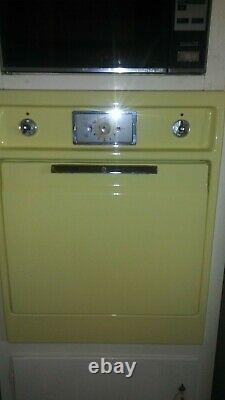 Vintage General Electric Oven, Stove, and over head fan