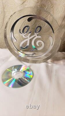 Vintage General Electric Retirement GE LOGO 6 lb circle plastic silver Lucite