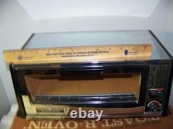 Vntg General Electric Toast-R-Oven model T94 deluxe king size Oven 4-slice NOS