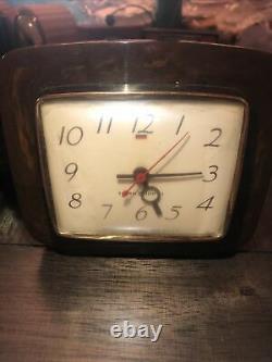 Vtg art deco Seth Thomas&General Electric brown swirl bakelite clock