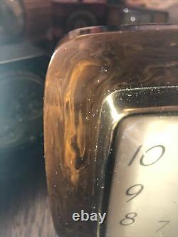 Vtg art deco Seth Thomas&General Electric brown swirl bakelite clock