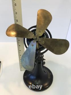 Ancien vieux ventilateur de bureau oscillant General Electric GE Whiz à 4 pales en laiton