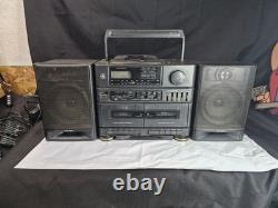 Boombox stéréo vintage General Electric portable avec lecteur cassette et CD. Fonctionne.