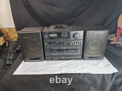 Boombox stéréo vintage General Electric portable avec lecteur cassette et CD. Fonctionne.