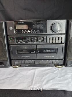 Boombox stéréo vintage General Electric portable avec lecteur cassette et CD. Fonctionne.