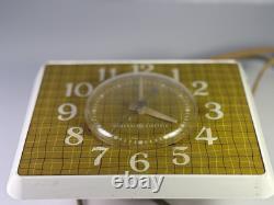 Horloge électrique à carreaux jaunes General Electric MCM des années 1950, testée et fonctionnelle, originale.