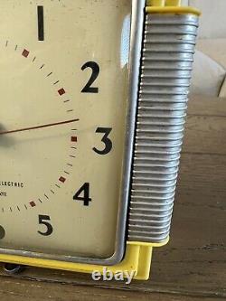 Horloge murale Vintage GE Telechron jaune des années 1940 modèle 2HA43 - FONCTIONNE PRINCIPALEMENT