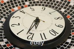 Horloge murale en carrelage mosaïque modèle 2090 de General Electric G. E., style vintage des années 1950.