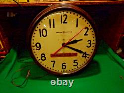 Horloge murale industrielle vintage General Electric Buffalo Scale en bakélite marron