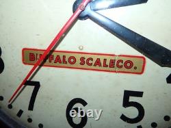 Horloge murale industrielle vintage General Electric Buffalo Scale en bakélite marron