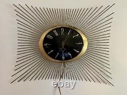 Horloge murale vintage G. E. Mid Century General Electric Starburst MCM en laiton