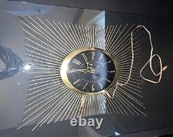 Horloge murale vintage de milieu de siècle G. E. General Electric Starburst MCM en laiton