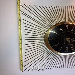 Horloge murale vintage de milieu de siècle G. E. General Electric Starburst MCM en laiton