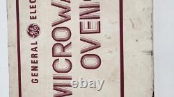 Panneau publicitaire en métal des fours à micro-ondes vintage de General Electric avec ledge en bas