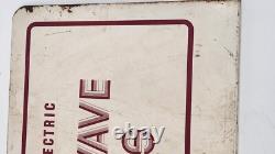 Panneau publicitaire en métal des fours à micro-ondes vintage de General Electric avec ledge en bas