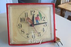 Petite horloge Little Black Sambo. Modèle vintage General Electric. Bon état de fonctionnement.