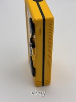 Radio portable vintage GE Action Pak AM/FM 7-1990 YLA avec étui, testé et fonctionne