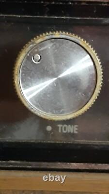 Radio stéréo de table à état solide Vintage General Electric GE en boîtier en bois fonctionne