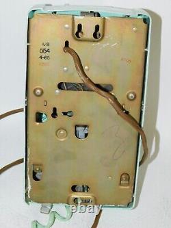 Téléphone mural rotatif turquoise bleu Bell System General Electric 554 A/B
