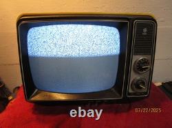 Téléviseur GE GENERAL ELECTRIC vintage de 1980, jaune et noir, fonctionne