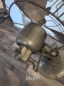 Ventilateur oscillant de bureau à trois pales noir General Electric GE antique 273100-1